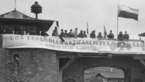 Liberated_prisoners_in_the_Mauthausen_concentration_camp_near_Linz,_Austria,_give_rousing_welcome_to_Cavalrymen_of_._-_NARA_-_531293.tif