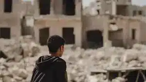 young-man-is-sitting-ruins-abandoned-building