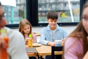 students-having-lunch-canteen_23-2149402897