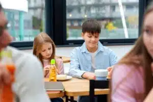 students-having-lunch-canteen_23-2149402897
